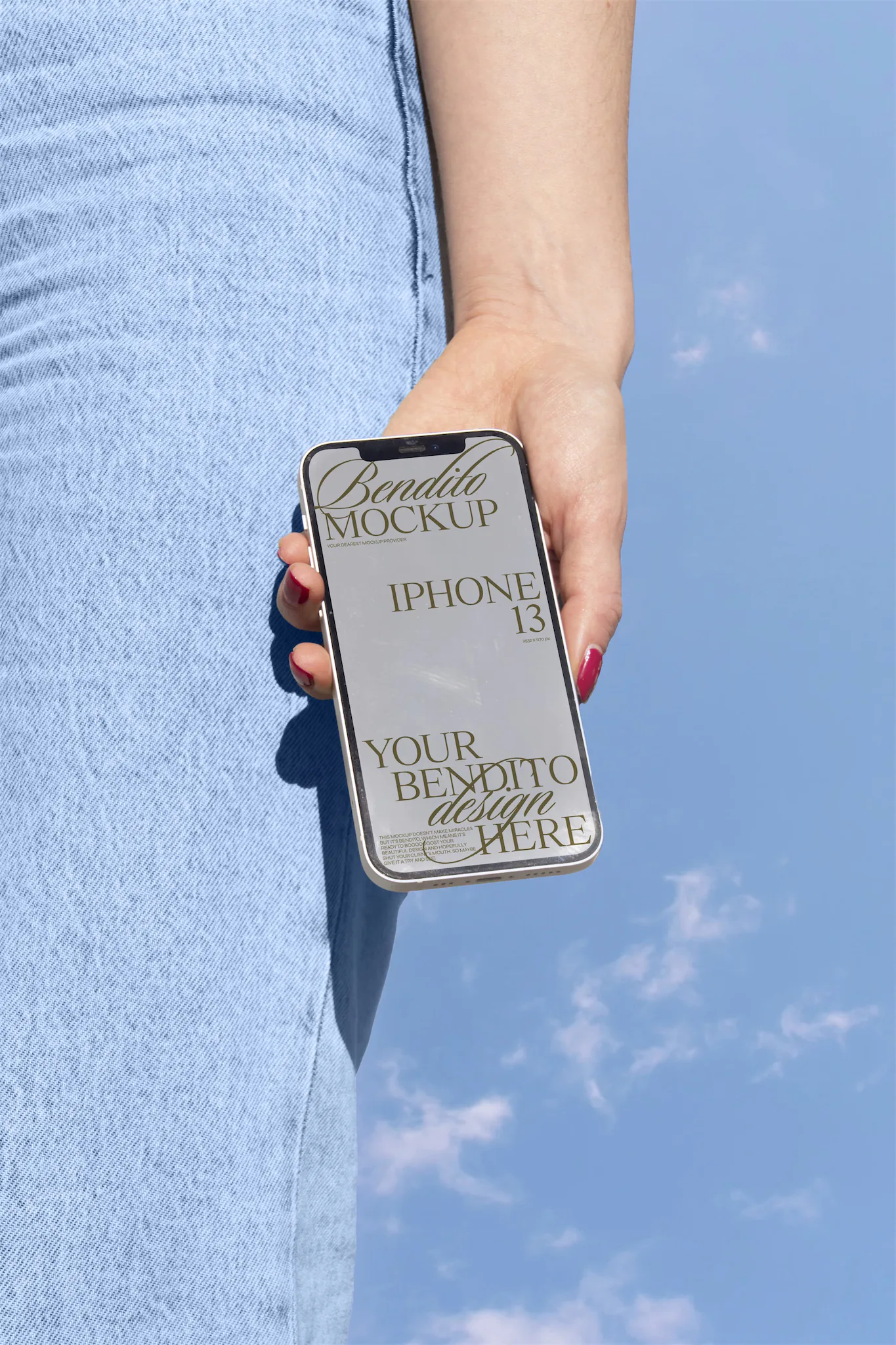 iPhone mockup being holded by human hand with sky background