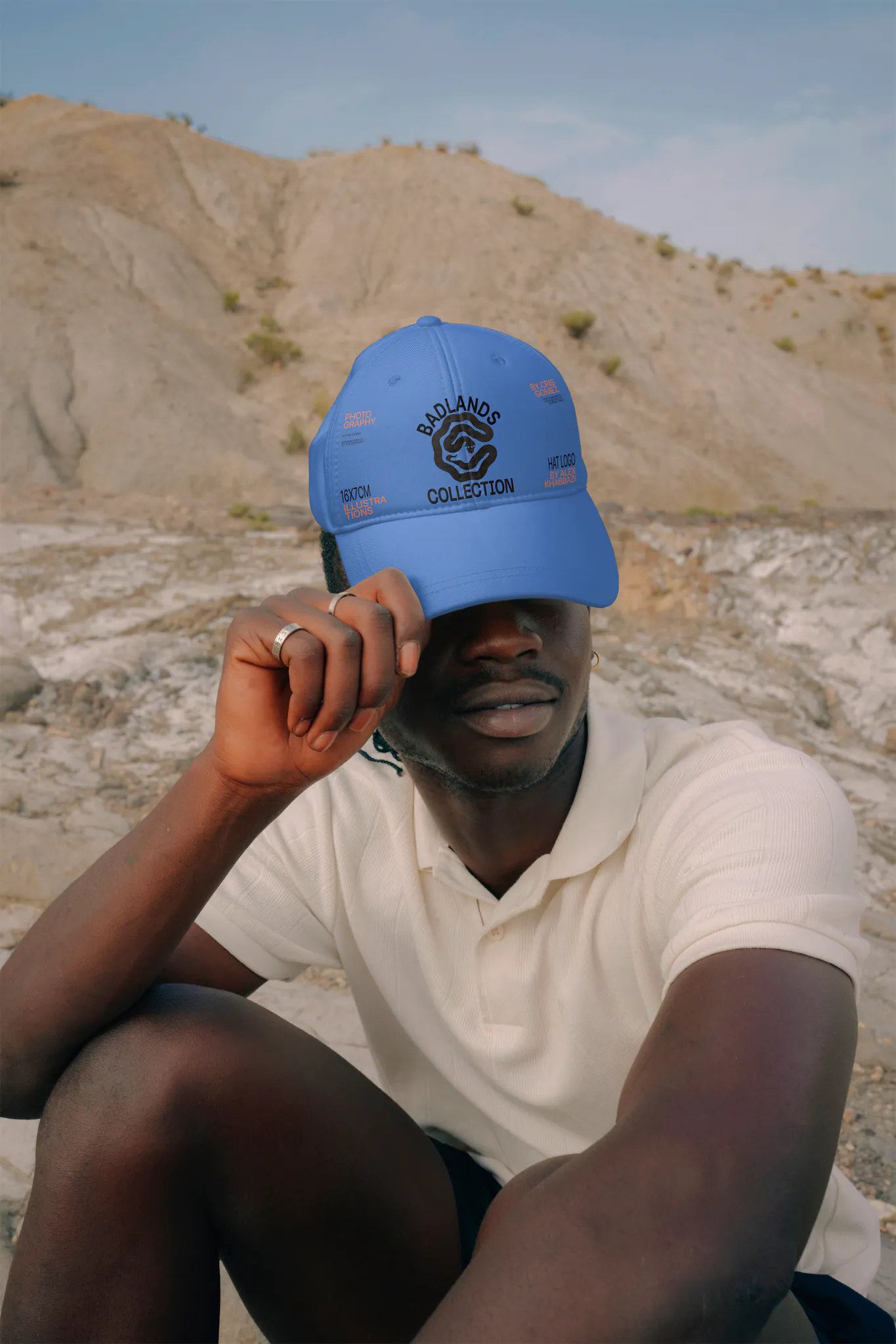 Black guy wearing a hat mock-up in a desert environment