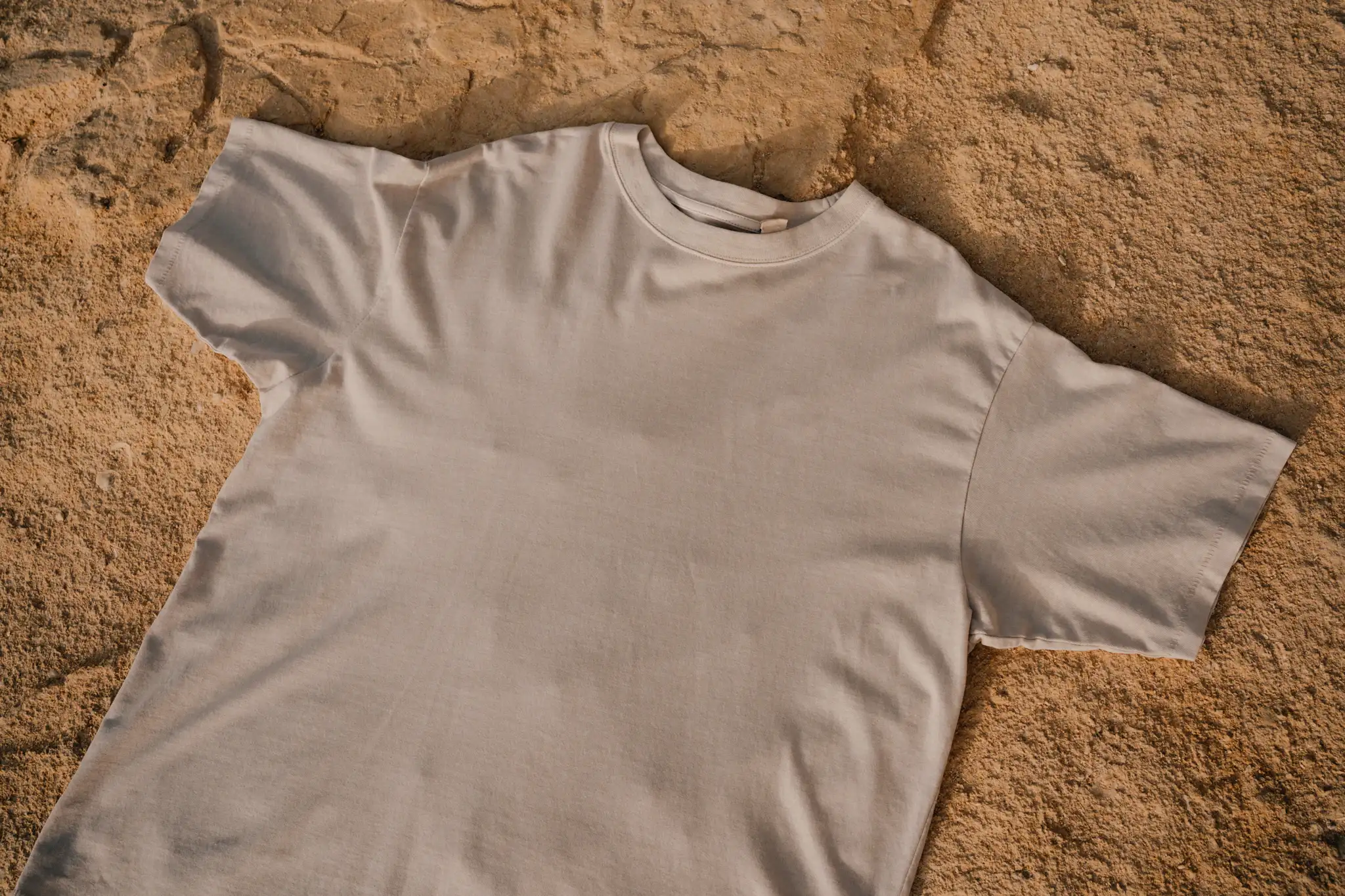 T-Shirt mock-up on a rocky surface