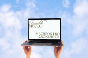 Macbook pro device mockup with sky background.