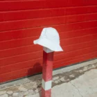 Bucket hat mockup in a urban scenario in the street.