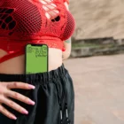 iPhone mockup with a model wearing urban streetwear.