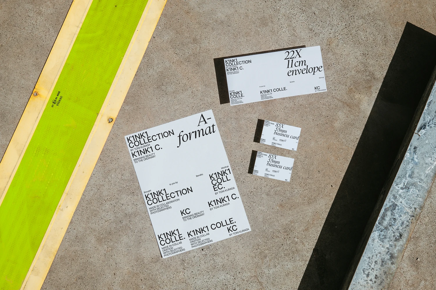 Urban stationery mockups placed in the floor and surrounded by industrial elements.