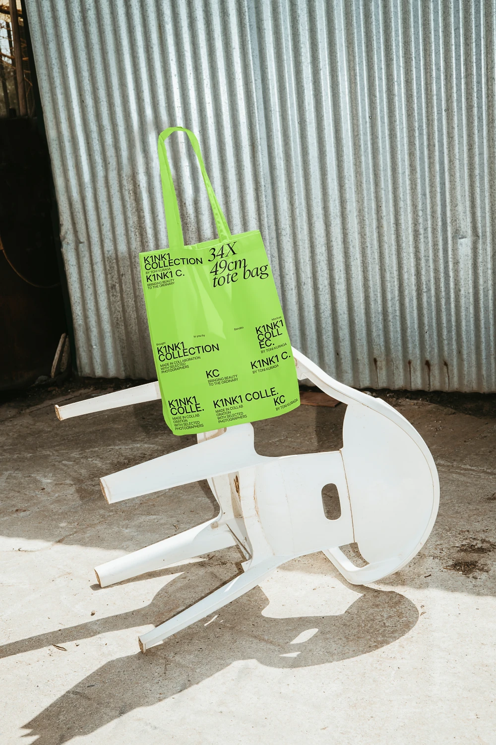 Urban tote bag mockup with a white plastic chair.