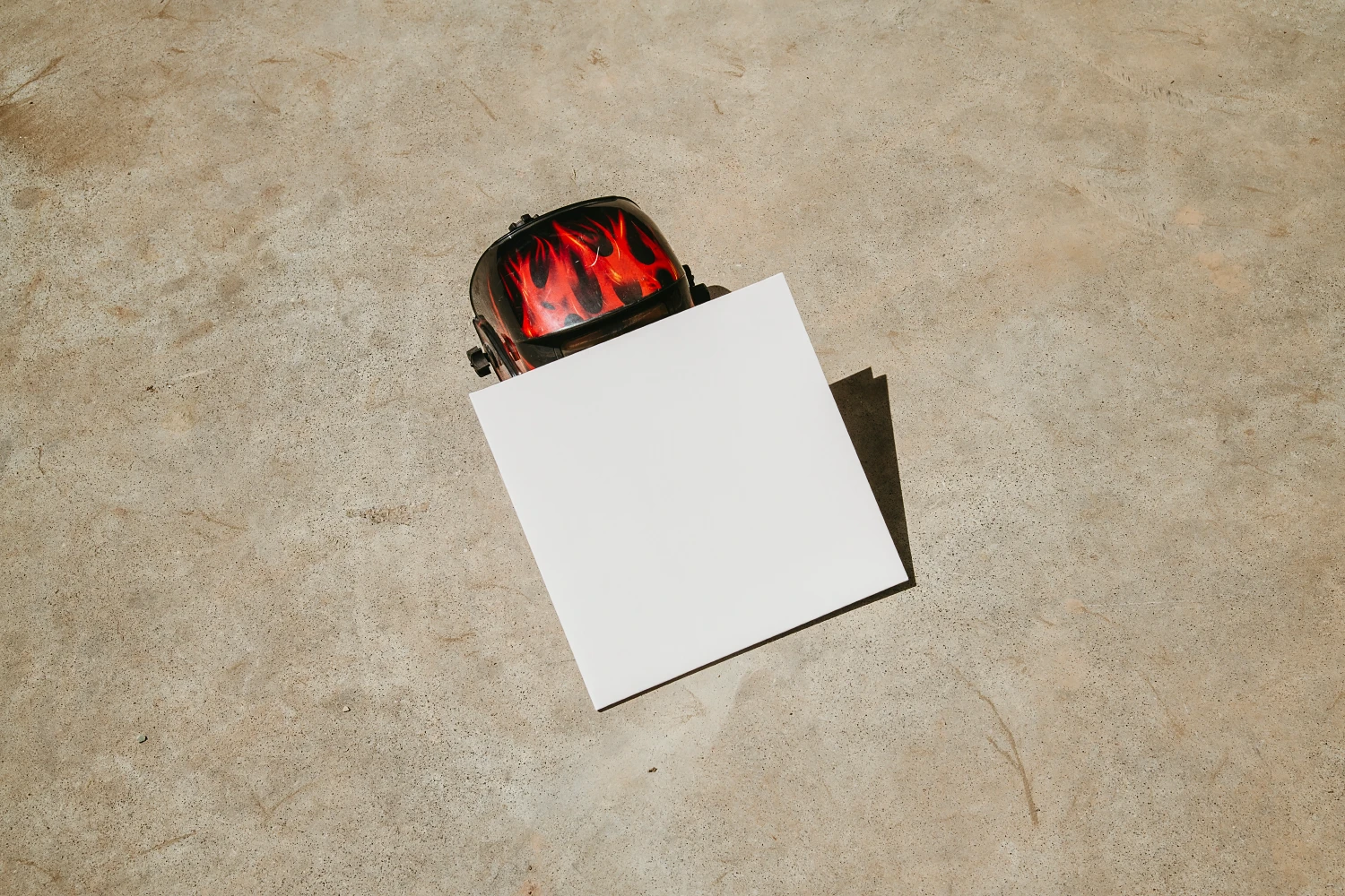 Urban vinyl mockup placed against an industrial helmet.