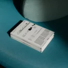 Book mockup on top of a green couch