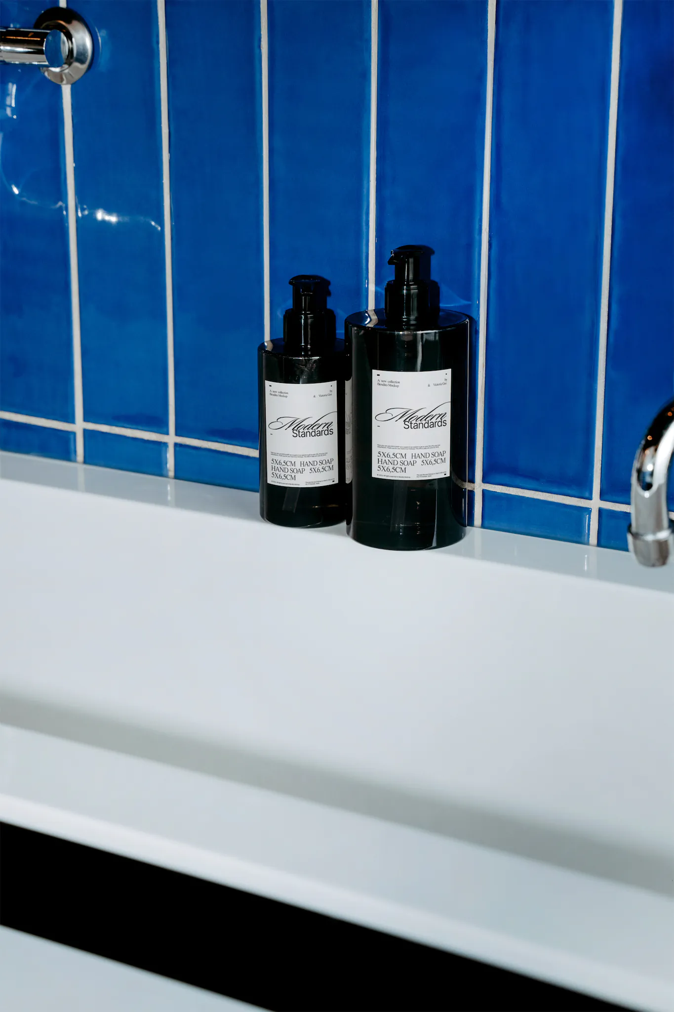 Hand soap mockup on a fancy sink in front of an elegant blue wall