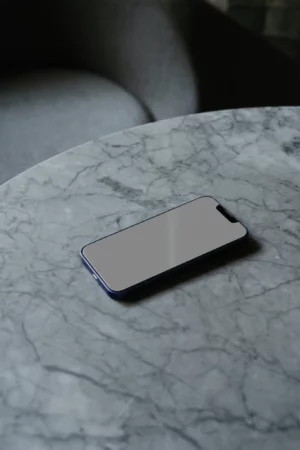 Iphone mockup on top of an elegan marble table