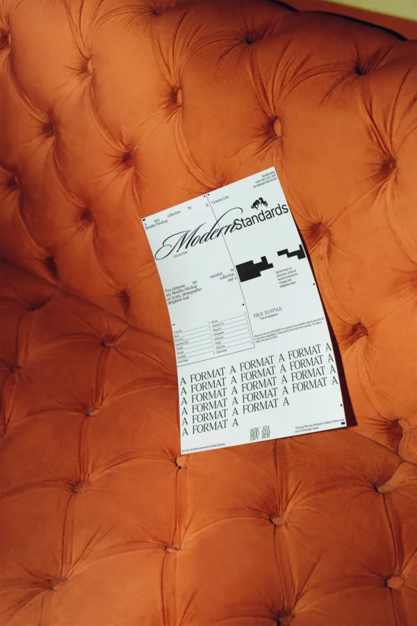 A Format mockup over a fancy orange couch