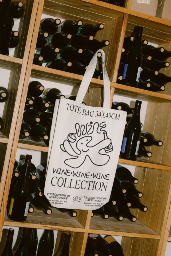 White tote bag PSD mockup. Tote bag mockup surrounded by wine bottles and cardboard boxes. Wine merchandising mockup. Restaurant mockup. Wine bar mockup. Fashion and apparel mockup.