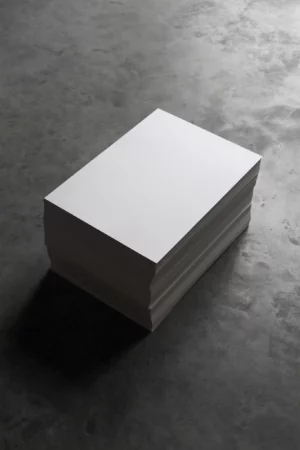 Block of A-Format mockup, resting on a concrete floor in an industrial space.