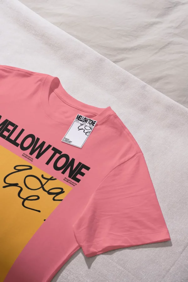 Premium t-shirt mockup laying on a bed with white sheets. High-quality short sleeve t-shirt mockup resting on top of a blanket. PSD mockup file of a white t-shirt, in a beautiful hotel with elegant and sophisticated furniture.