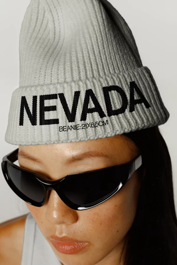 Woman wearing a white beanie mockup, PSD mockup file of a woman wearing a beanie mockup, beanie mockup, apparel mockup, clothing mockup, fashion mockup, premium quality clothing mockup.