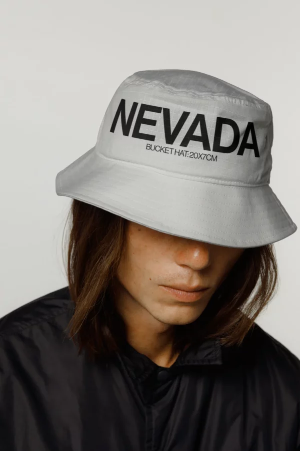 Man wearing a bucket hat mockup, clothing PSD file, bucket hat mockup, apparel mockup, premium quality bucket hat mockup.