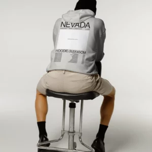 Male sitting on a chair wearing a hoodie mockup, PSD file of a man wearing a hoodie mockup, fashion mockup, hoodie mockup, clothing mockup.