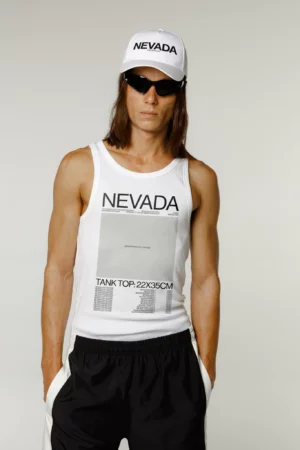 Man with long hair and black shades wearing a white tank top mockup and a white hat mockup