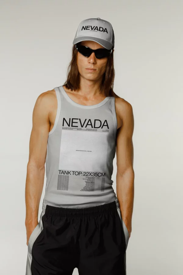 Man with long hair and black shades wearing a white tank top mockup and a white hat mockup, PSD file, white hat mockup, white tank top mockup, clothing mockup, fashion mockup, high quality clothing mockup.
