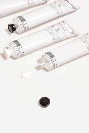 Set of cosmetic tubes mockup on a white surface. Cosmetic tube mockup. Skin care packaging mockup. Premium quality skin care mockup.