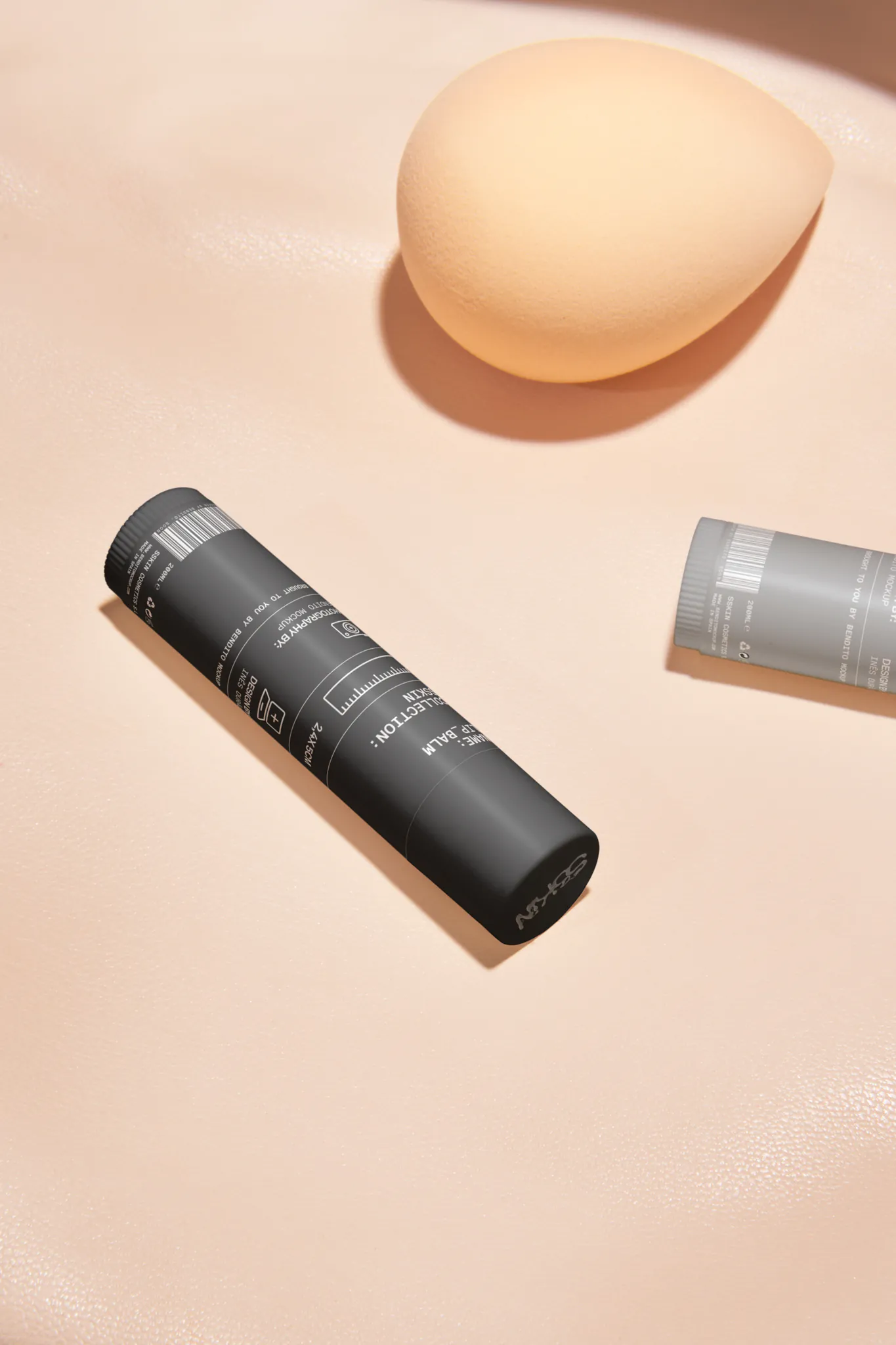 2 Lip balms mockup over a leather surface. Lip balm mockup. Packaging mockup. Premium quality skin care mockup.