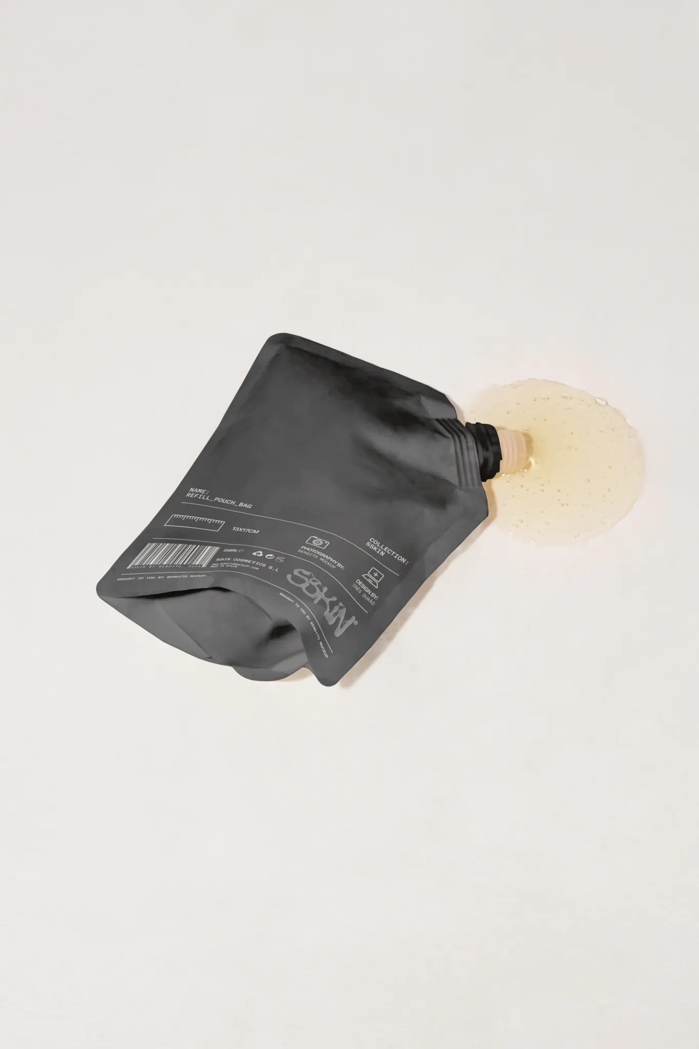 Refill pouch bag mockup with the liquid soap getting outside the bag over a white surface. Refill pouch bag PSD file. Packaging mockup. High-quality skin care mockup.