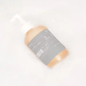 Soap bottle mockup inside water with bubbles. Soap bottle PSD file. Soap bottle mockup. Premium quality skin care mockup.
