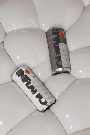 2 cans mockup laying on an off-white puffy structure. Can mockup. Can PSD file. 3d mockup. Packaging mockup. Premium quality can mockup.