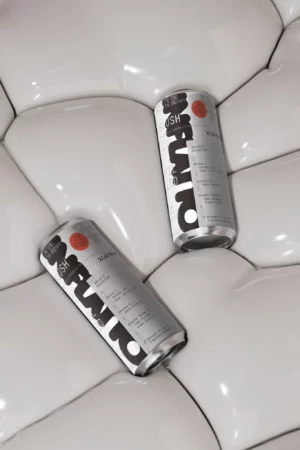2 cans mockup that are rotating on an off-white puffy surface that is moving. Can mockup. Can mockup video. Can AE file. Packaging mockup. Animated can mockup. Premium quality packaging mockup.