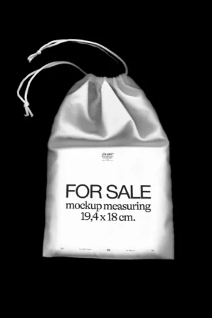 Hanging bag mockup with black background. White bag mockup with minimalist background. Canvas bag mockup which is perfect for presenting a brand design. High quality mockup.