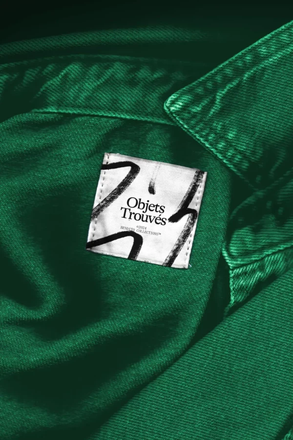 Mockup of fabric label on a blue denim shirt, mockup of square label with scanned effect, mockup of flattened label next to the collar of a shirt. High quality mockup for Adobe Photoshop.