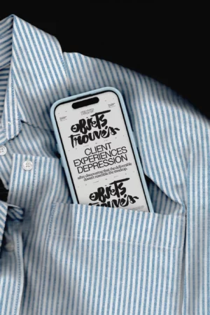 iPhone mockup inside of a striped shirt, scanned effect iPhone mockup perfect to showcase website design, cell phone mockup placed inside of a pocket, iPhone mockup against a black background, scanned device with cool effect, high quality mockup.