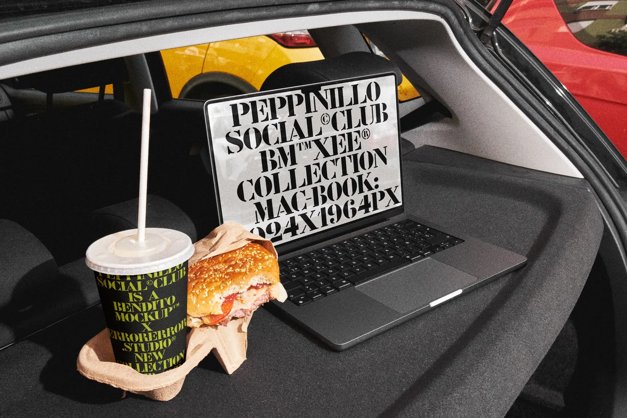 MacBook Pro mockup with a disposable paper cup mockup which is together with a burger on top of a car trunk cargo cover in a fast food restaurant parking. Device mockup. MacBook Pro PSD file. Packaging mockup. Drink Mockup. Paper cup mockup. Fast food mockup. High-quality paper cup mockup. MacBook Pro PSD high-quality editable file.