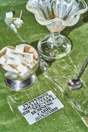 Aesthetic premium business card mockup on restaurant table. High quality business card mockup on table next to dessert. Business card mockup file for Adobe Photoshop.