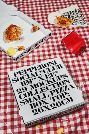 Premium pizza box mockup on a checkered table cloth in an italian restaurant. High quality packaging mockup for a fast food pizza restaurant. Food mockup. Aesthetic PSD file for your restaurant brand.