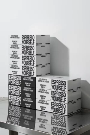 Stack of Espresso Yourself coffee boxes mockup