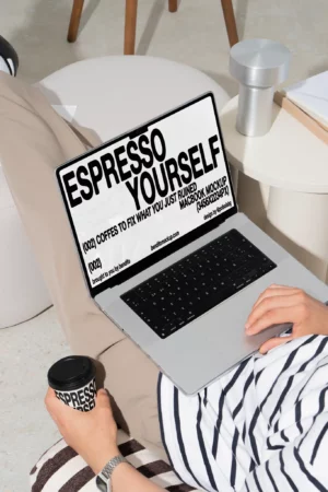 Person using a MacBook displaying Espresso Yourself branding