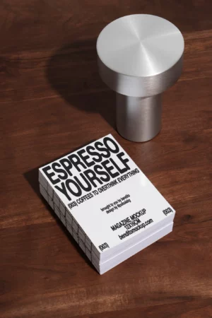 Stack of Espresso Yourself magazines on a wooden table