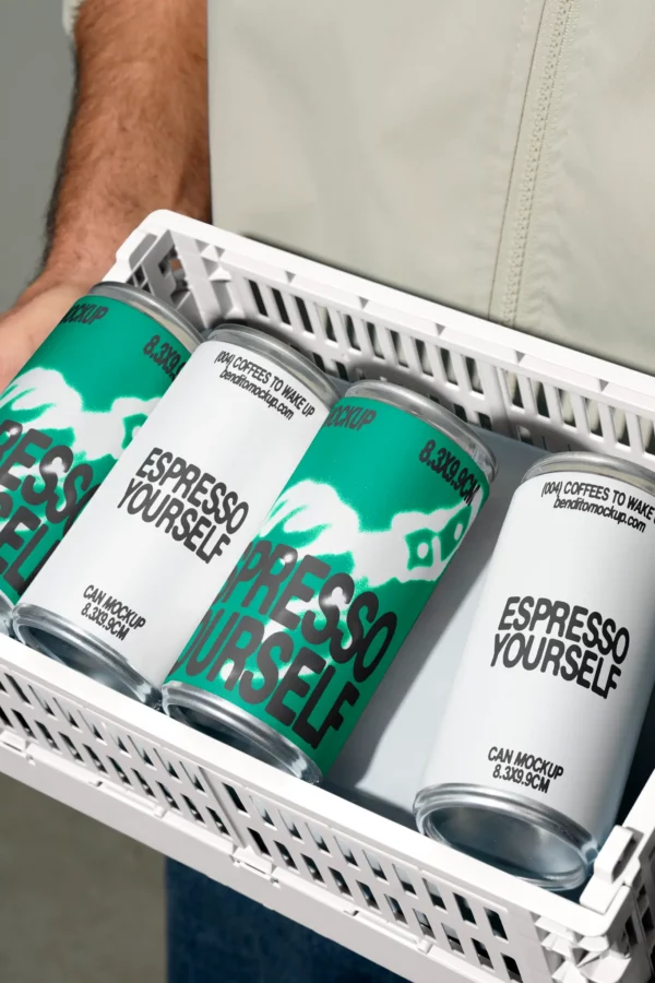 Color Version: Person holding a tray with Espresso Yourself coffee cans
