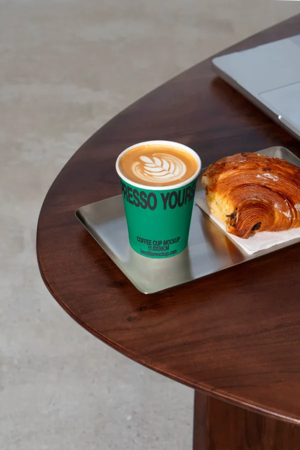 Color Version: Espresso Yourself cappuccino cup with pastry on wooden table