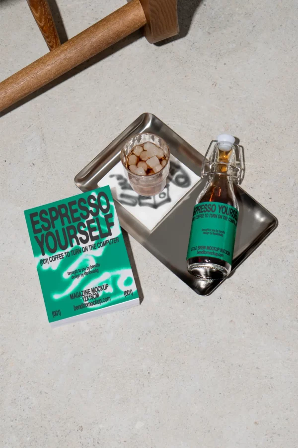 Color Version: Espresso Yourself cold brew bottle with a glass of iced coffee on a tray