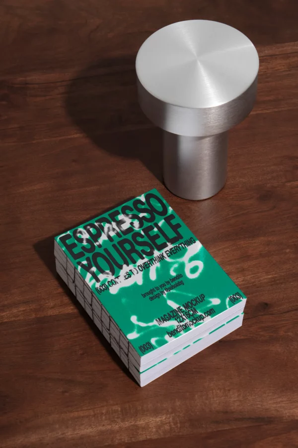 Color Version: Stack of Espresso Yourself magazines on a wooden table