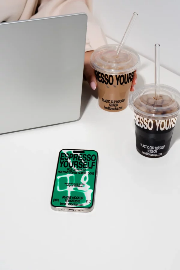 Color Version: Espresso Yourself iPhone case and coffee cups on a desk