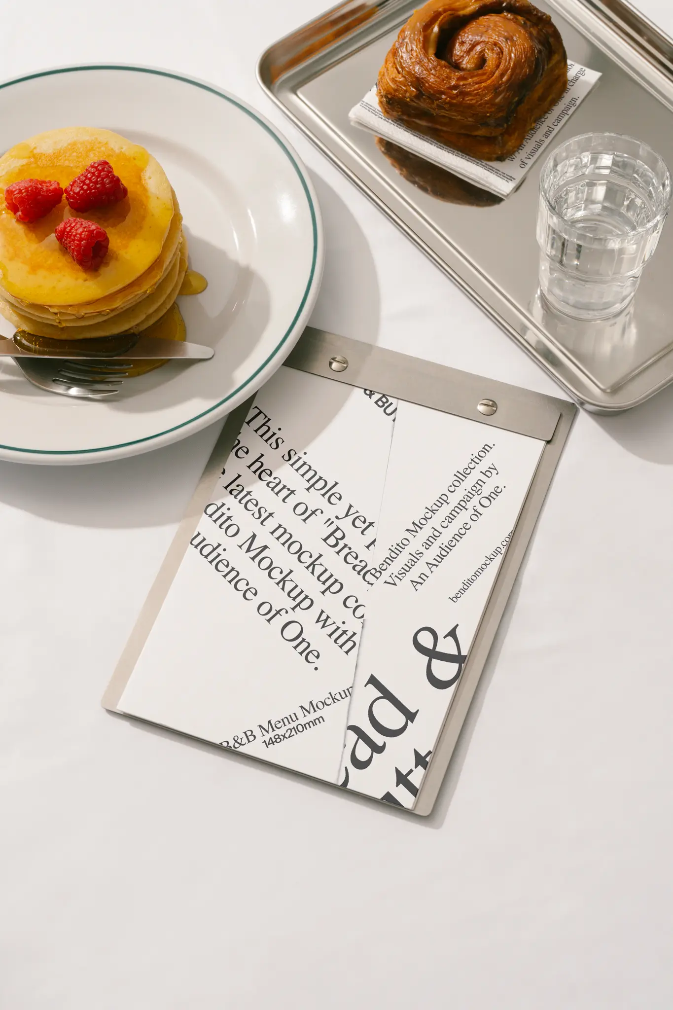 Menu mockup from the Bread & Butter collection with a plate of pancakes and a pastry on a tray.