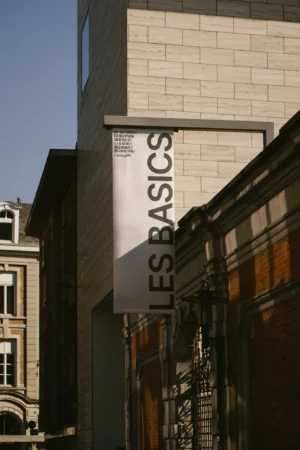 Hanging banner mockup placed in a narrow alley.