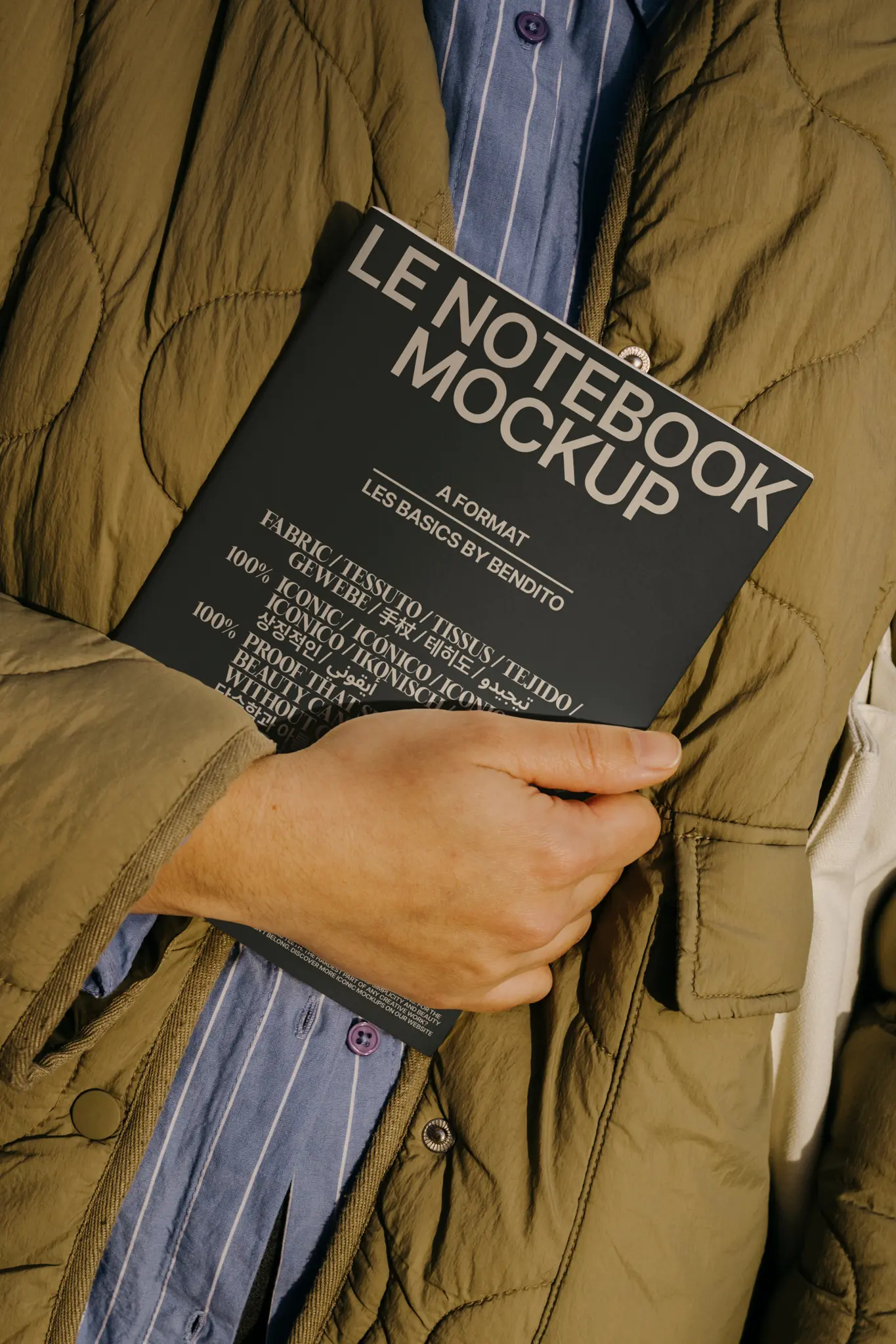 Hover image: A spiral-bound notebook with a plain cover lies open on a flat surface