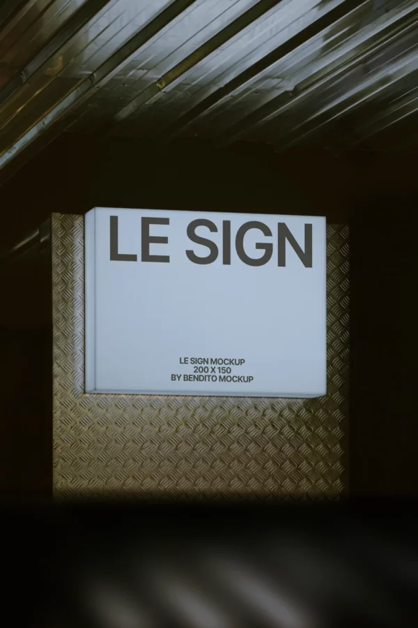 Backlit square sign mockup mounted on industrial metal wall. Dimensions: 200 x 150 mm.