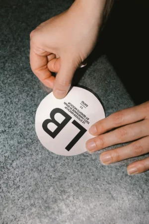 Mockup of a sticker displayed on a light background.