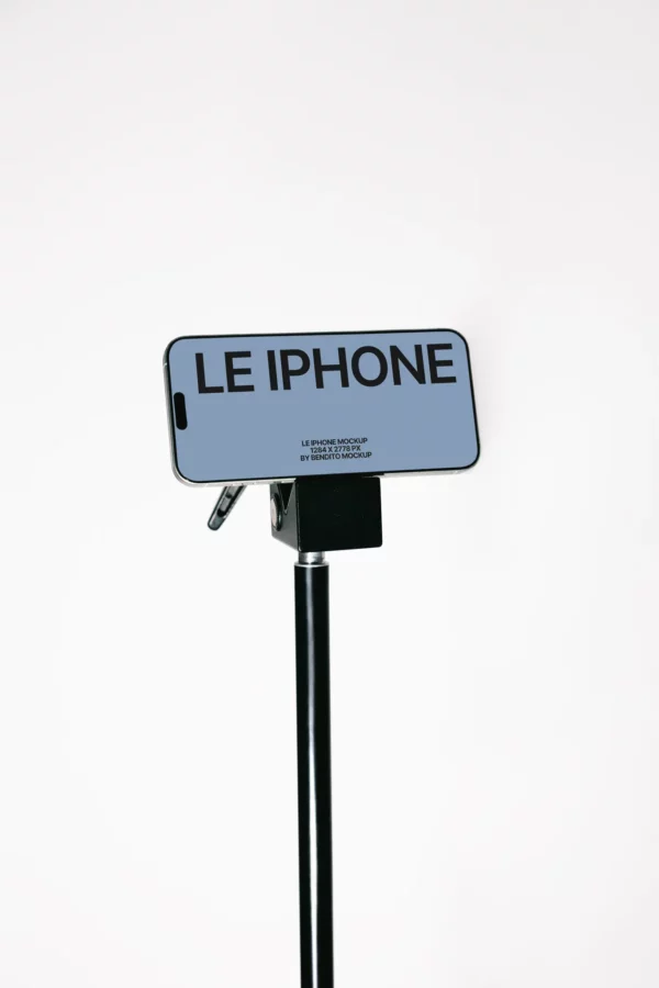 A smartphone displaying the text LE IPHONE is mounted horizontally on a black stand against a plain white background.