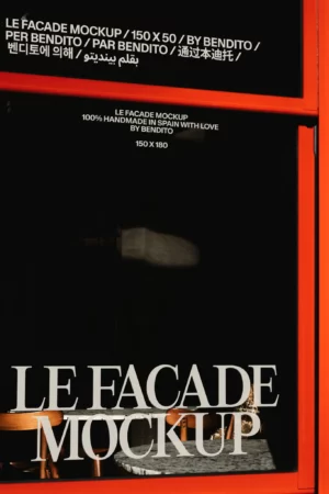 A modern storefront window with bold text reading LE FACADE MOCKUP in large letters, and smaller details above about the mockups size and origin in multiple languages. Reflections and shadows are visible on the glass.