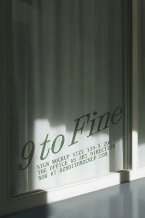 A window with sunlight streaming through displays the text 9 to Fine along with sign mockup details and a website link in green lettering. Curtains and shadows are visible behind the glass.
